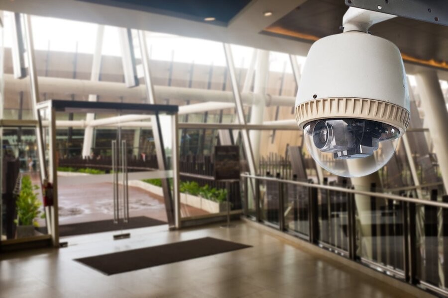 A smart camera from a video surveillance system in a commercial setting.